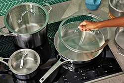 Frying pan + cooking pot + utensils Frying pan + cooking pot + utensils