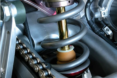 Titanium spring installed on a motorcycle