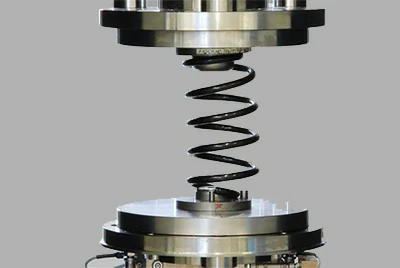 Compression spring undergoing load